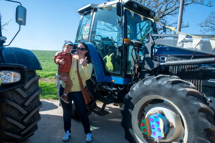 Harvey Bitter and mum Chloe were among the visitors admiring the tractors.