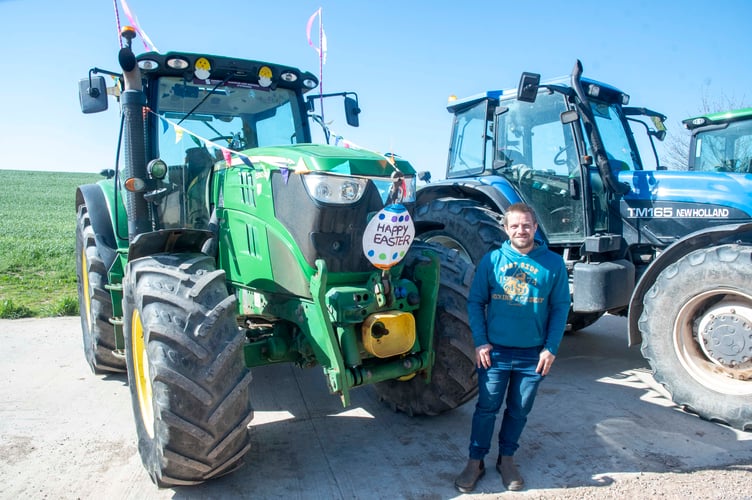 Luke Philpotts of Lydney with his John Deere tractor.

