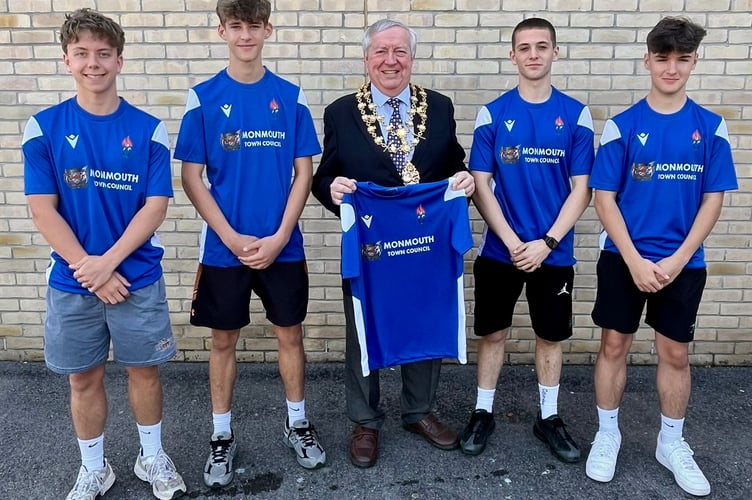 Mayor of Monmouth Cllr David Evans presents new kit to Monmouth Comprehensive's Welsh Schools Cup final squad