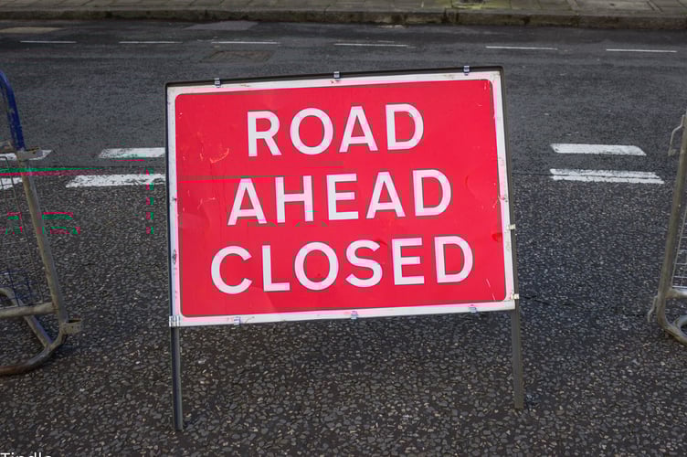 Road closed sign