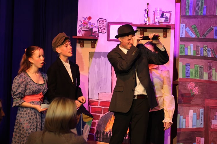 Mr Banks, played by Alfie Blake, embraces a new perspective with children Jane and Michael, played by Isla Armstrong-Hitchings and Ryan Winman