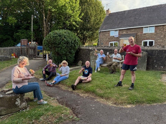 Churchyard workers say cheers !