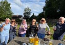 Volunteers revitalise historic churchyard