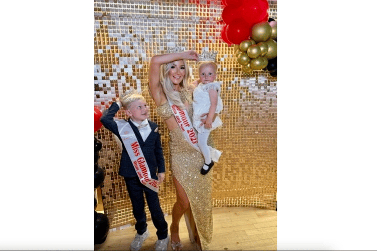 Emily Kathleen Udell and her children celebrate winning the Ms Glamour UK crown