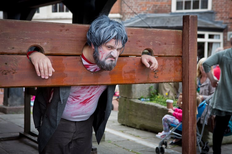 Man in stocks