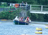 Crew rows Lydney skiff Emerald for the first time