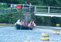 Crew rows Lydney skiff Emerald for the first time