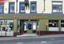 Chepstow staff walk in storm for Mencap