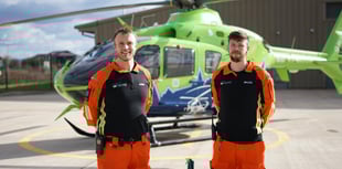 MP walks on fire for air ambulance