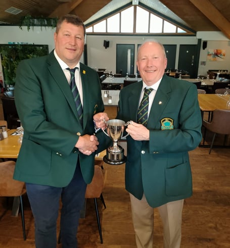Mark Graham presents the Richard Mudge Memorial Trophy to Brickhampton Court's Chris Dooley.