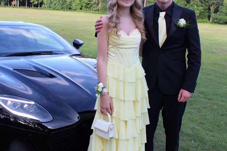 Two friends with a high-performance car.