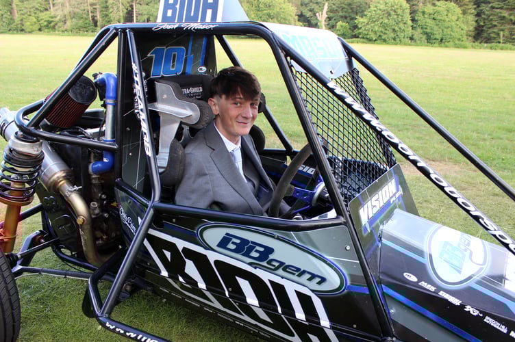 Josh Mason behind the wheel of an autograss car.