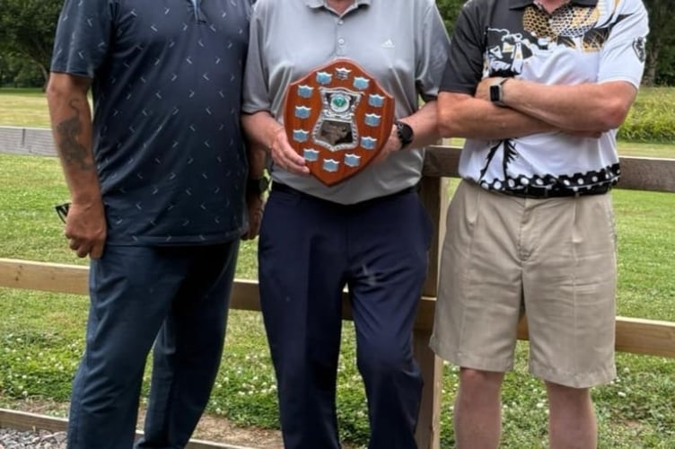 Pat Simcoe, Keith Bell and Phil Golden with the Armed Forces Trophy.