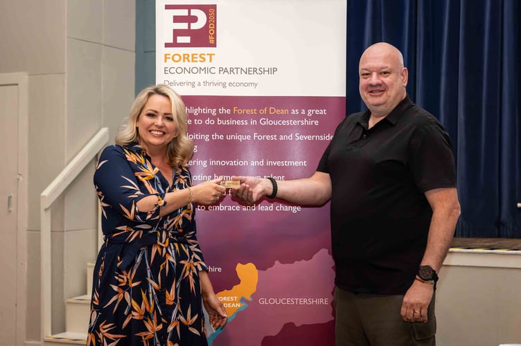 Nicola Bird is presented with the Chair's badge of office by Neil Ricketts.