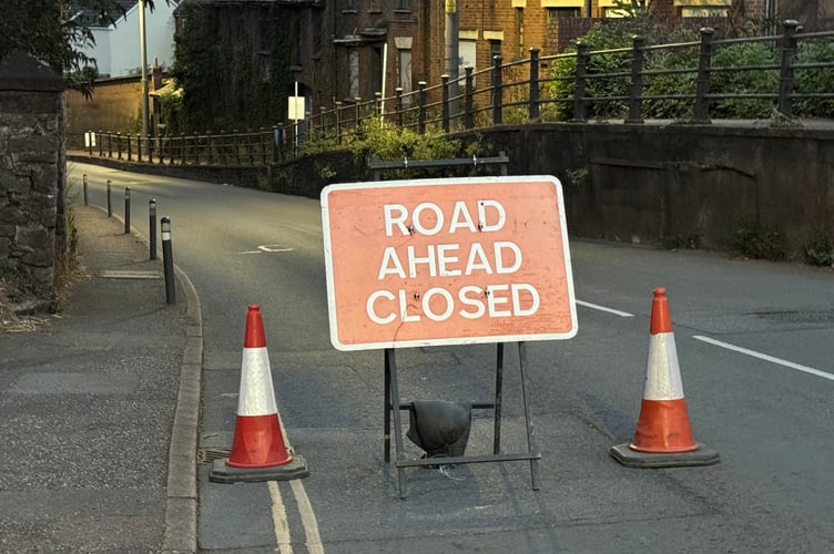 The road closed sign near Hillbrow Residential Home.  AQ 1607
