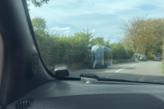 Car on its side near St Briavels