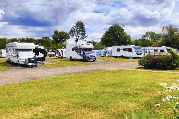 A large touring group of motorhomes making the most of the site’s facilities.