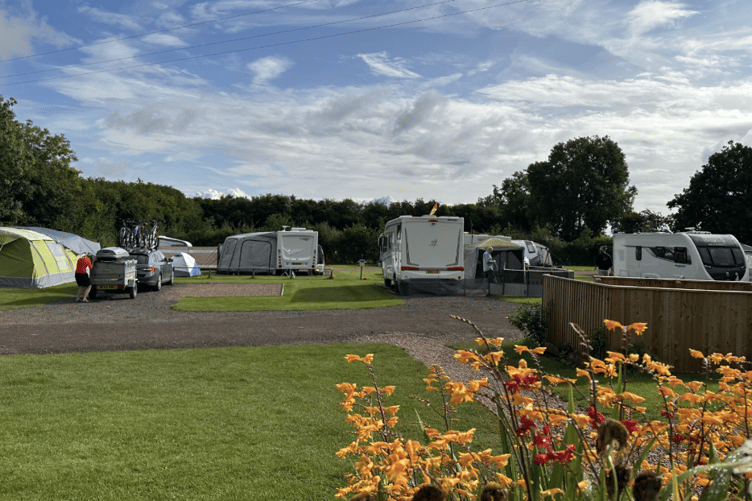 Caravan pitches providing a spacious and well-kept area for touring visitors.