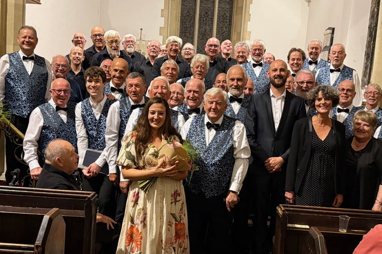 Soprano Kirsten Baker and the choirs pictured at the end of the concert.