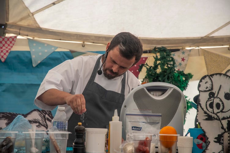 Aaron Christopher, head chef of The Tudor Farmhouse in Clearwell, prepares a duck dish using meat from St Briavels.