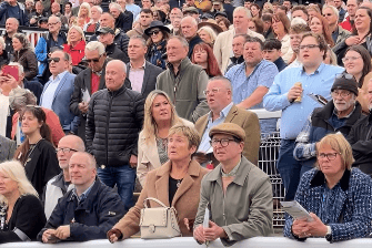 Spectators enjoy the action and autumn sunshine on Saturday.