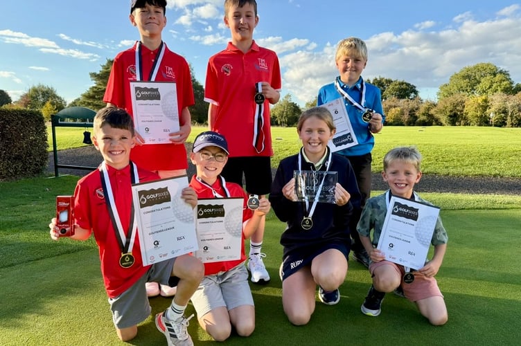 Ross Golf Club's Sixes League juniors proudly show their trophies