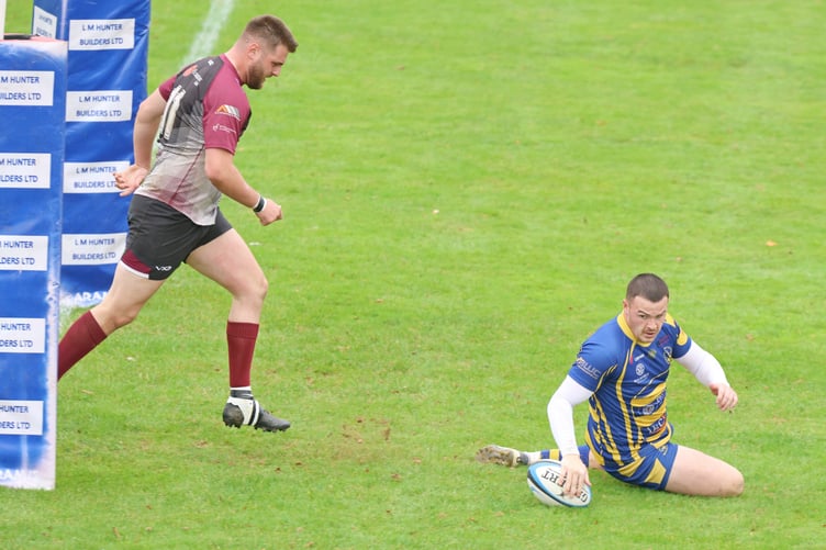 Lewis Bates crosses for his second score