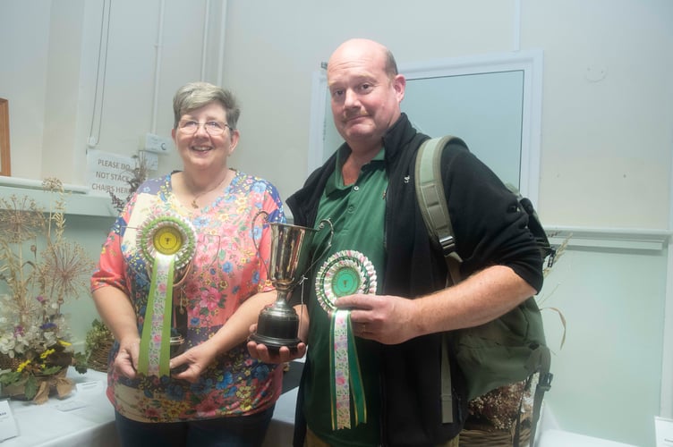 Trudy Breadman with the Albert Pearce for best âBountiful Harvestâ exhibit and Martin Thompson with the Hancock Cup for most points in the produce section.
