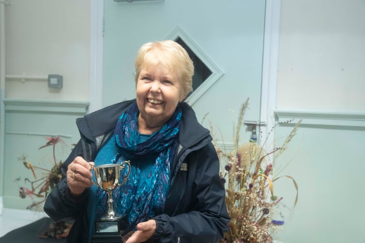 Julie Cockle won the Phelps Cup for the best wax in the honey show.