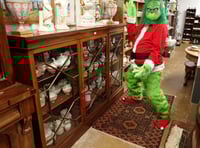 The Grinch pays a pre Christmas sale visit to Smiths