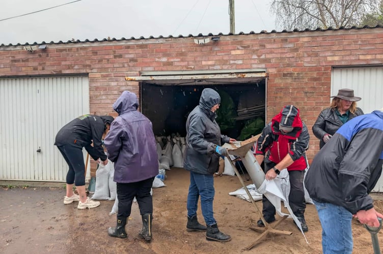 Volunteers filling sandbags. Picture: Lydney Town Council.