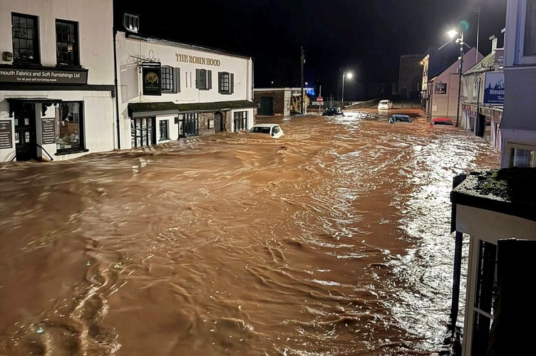Flooded scenes in Monnow, Street, Monmouth, South Wales.  November 15, 2025.  Storm Claudia causes chaos across the UK - as a river broke its banks and submerged a Waitrose. A major incident was declared in South Wales due to "severe and widespread" flooding in Monmouth.   The River Monnow broke its banks in the early hours of the morning on November 15 (Sat) and has left cars and high street shops underwater. 