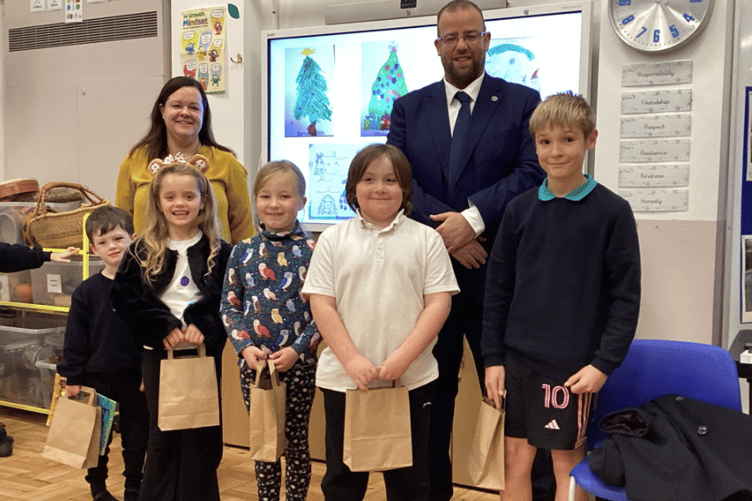 Matt Bishop joins pupils at Ellwood Community Primary School