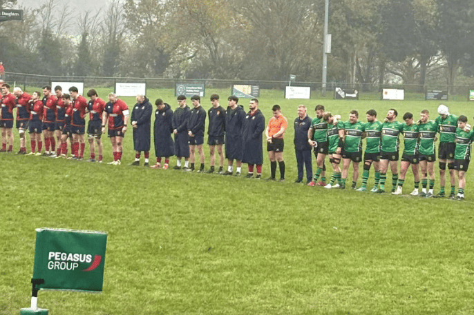 The teams stand together before kick off at Lichfield ahead of a tough afternoon for Drybrook.