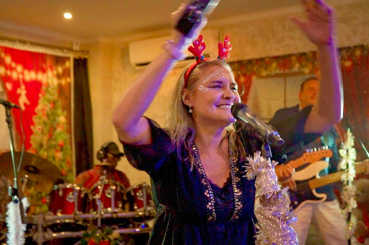 Katy sings the Christmas single with the Wild Ones