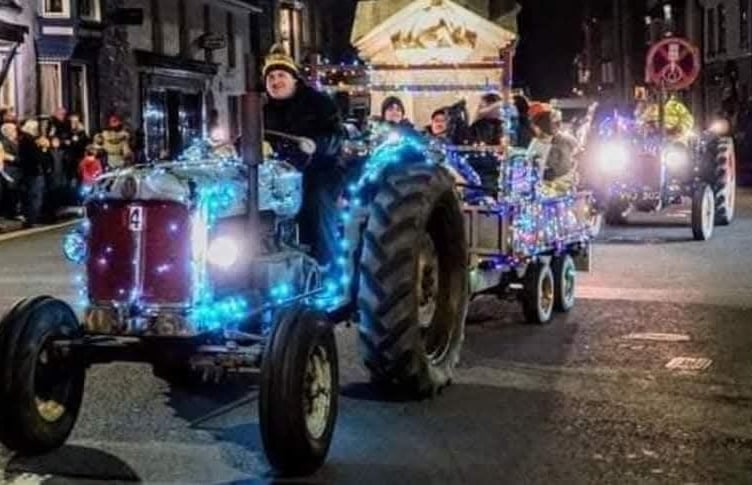 A festive tractor rolls through last year