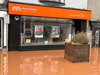 Flood-hit building society commits thousands to boost town recovery
