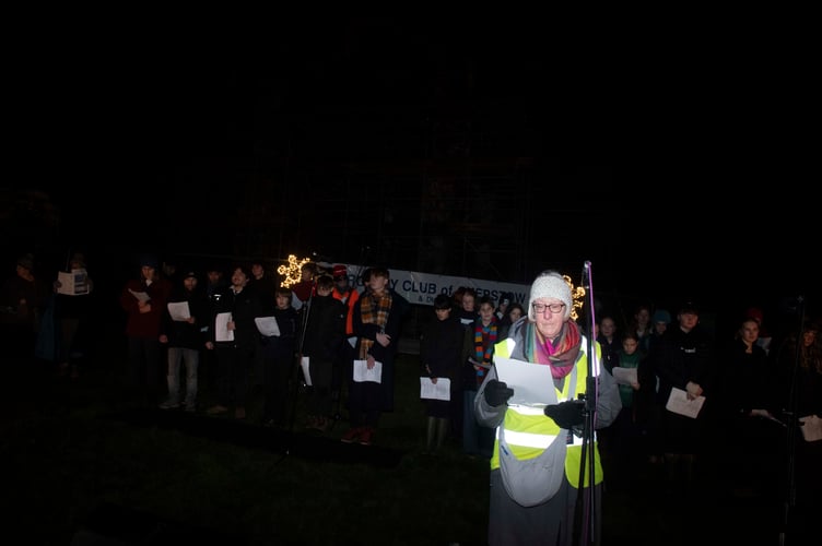 Beryl Metcalf reads one of the lessons.