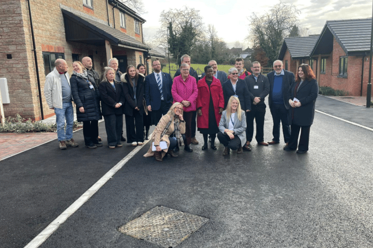 MP Matt Bishop pictured with Two Rivers Housing staff during a visit to the new affordable housing development in Berry Hill, where 37 homes have been completed.