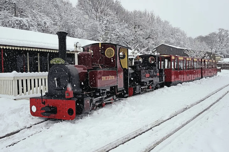 A Perrygrove Railway steam locomotive pulls into the station ahead of the Winter Warm-Up Steam Gala