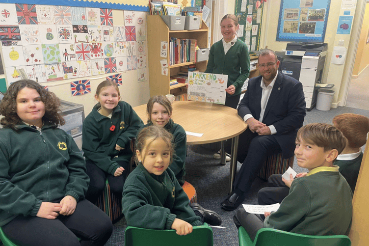 Matt Bishop MP with Parkend Primary pupils after learning about how the school saves energy.