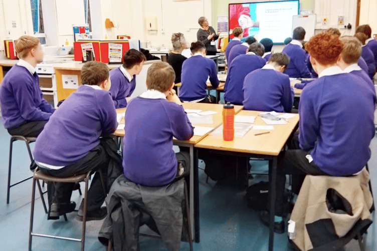 Boys take part in the Rethinking Masculinity session, exploring pressures on men and challenging stereotypes.