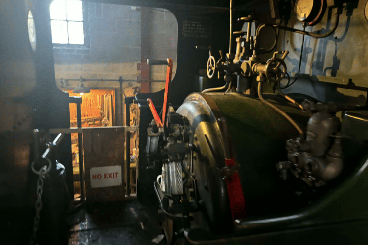 Inside the cab of the restored steam shunter, a highlight of the engine shed.
