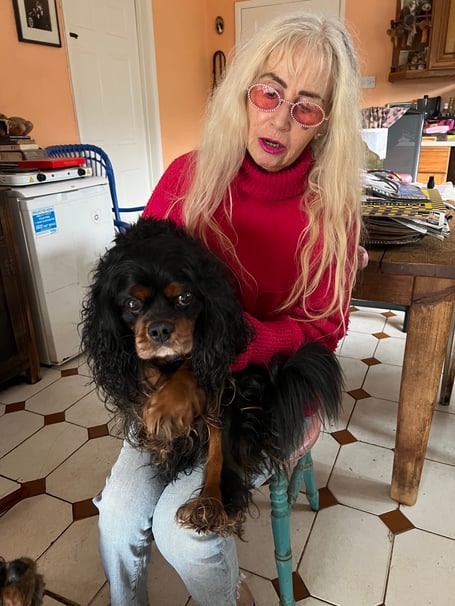 Tanya Tennant at her home in Dymock holding dog Luca.