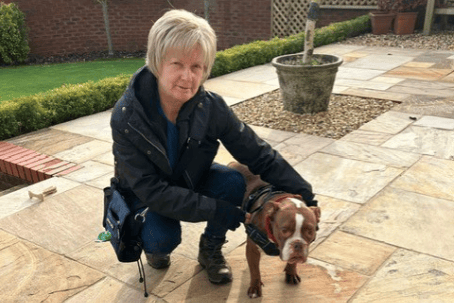 Jackie Archer with her dog Bruno, who she rescued after he fell into the water at Lydney Docks during a walk.
