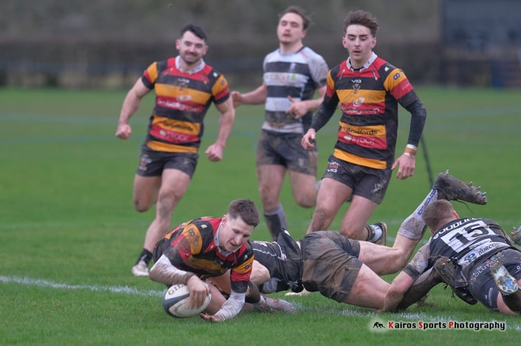 Jack Condliffe scores for Cinderford. Picture: Kairos Sports Photography.