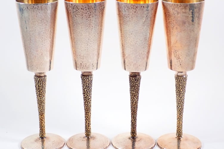 Four Stuart Devlin Champagne Flutes