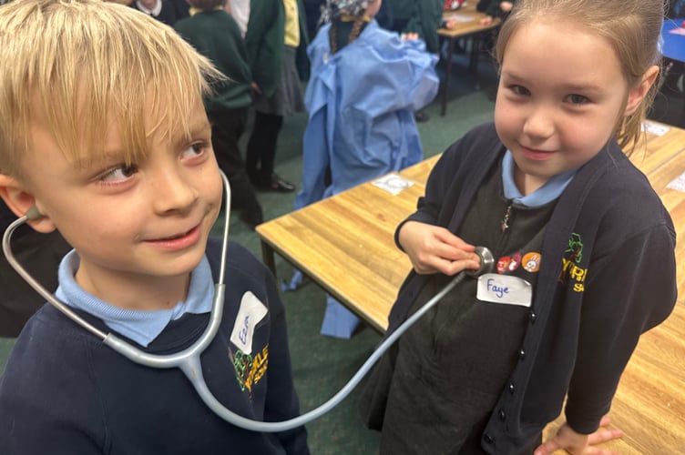 Listening for a heartbeat.