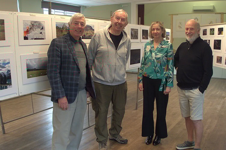 The four local photographers from the Forest of Dean Camera Club showcase their work at the Clearwell exhibition.