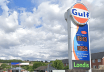 Man charged with armed robbery at Lea Garage on A40